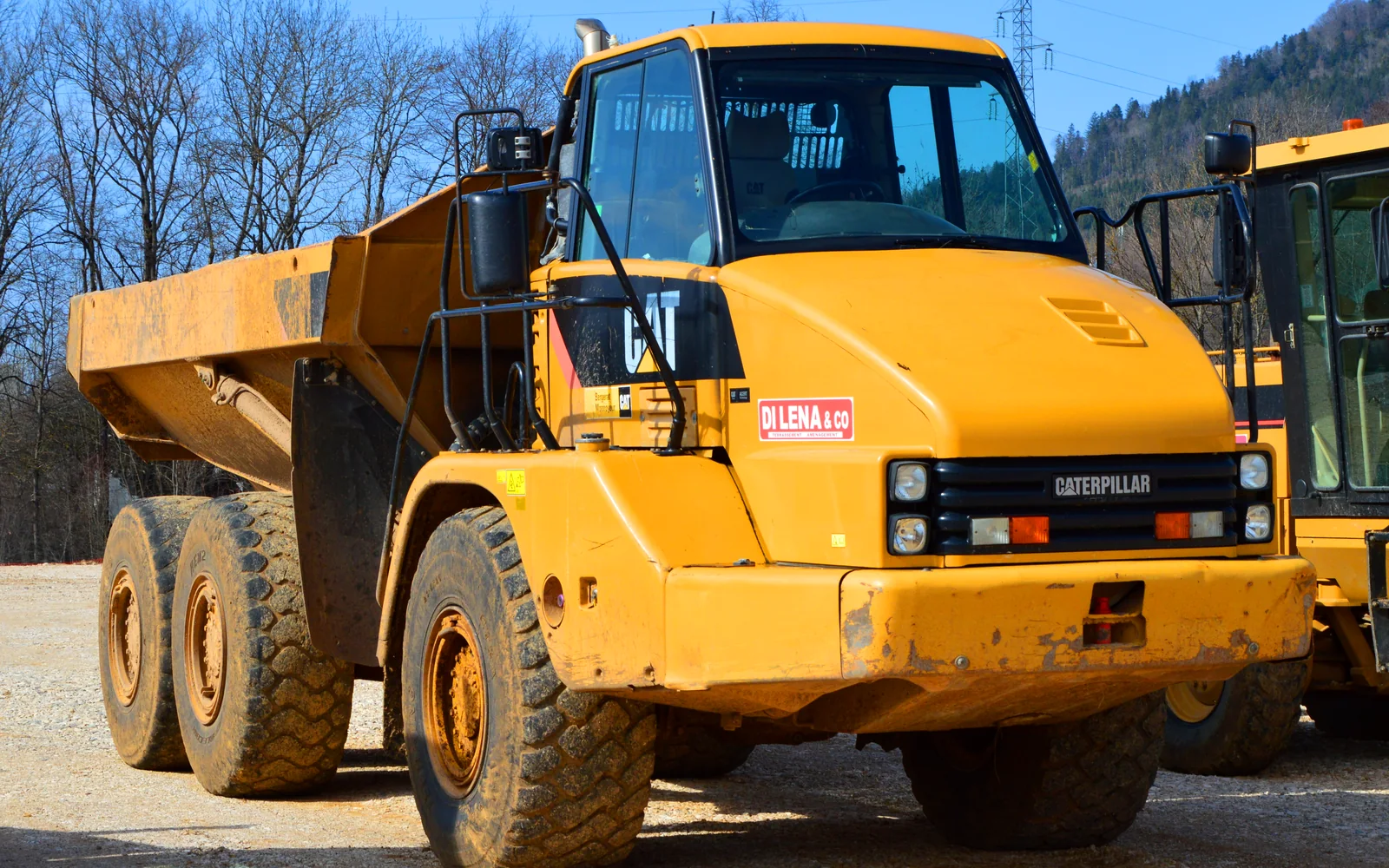 Articulated dump truck representing MEC construction equipment supply